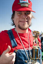 Doc gives a thumbs up, and shows off his trophy from last year!