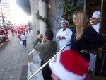 300 santa costumes $9000
Crowd reaction... $Priceless